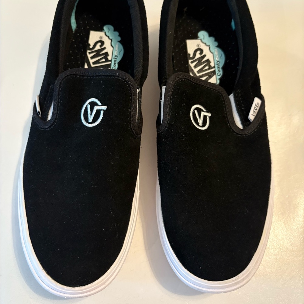 Vans men’s Black Slip-On off the wall Shoes
